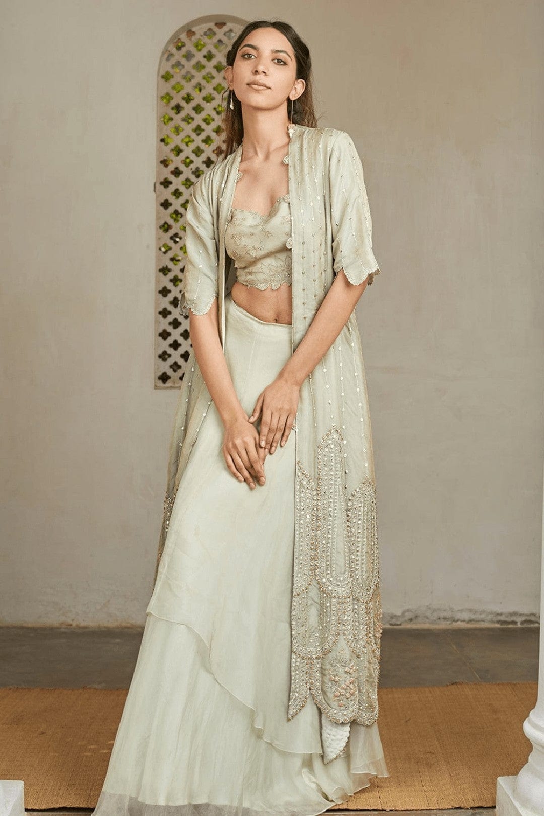 Ivory Optical Embroidered Jacket Lehenga Set